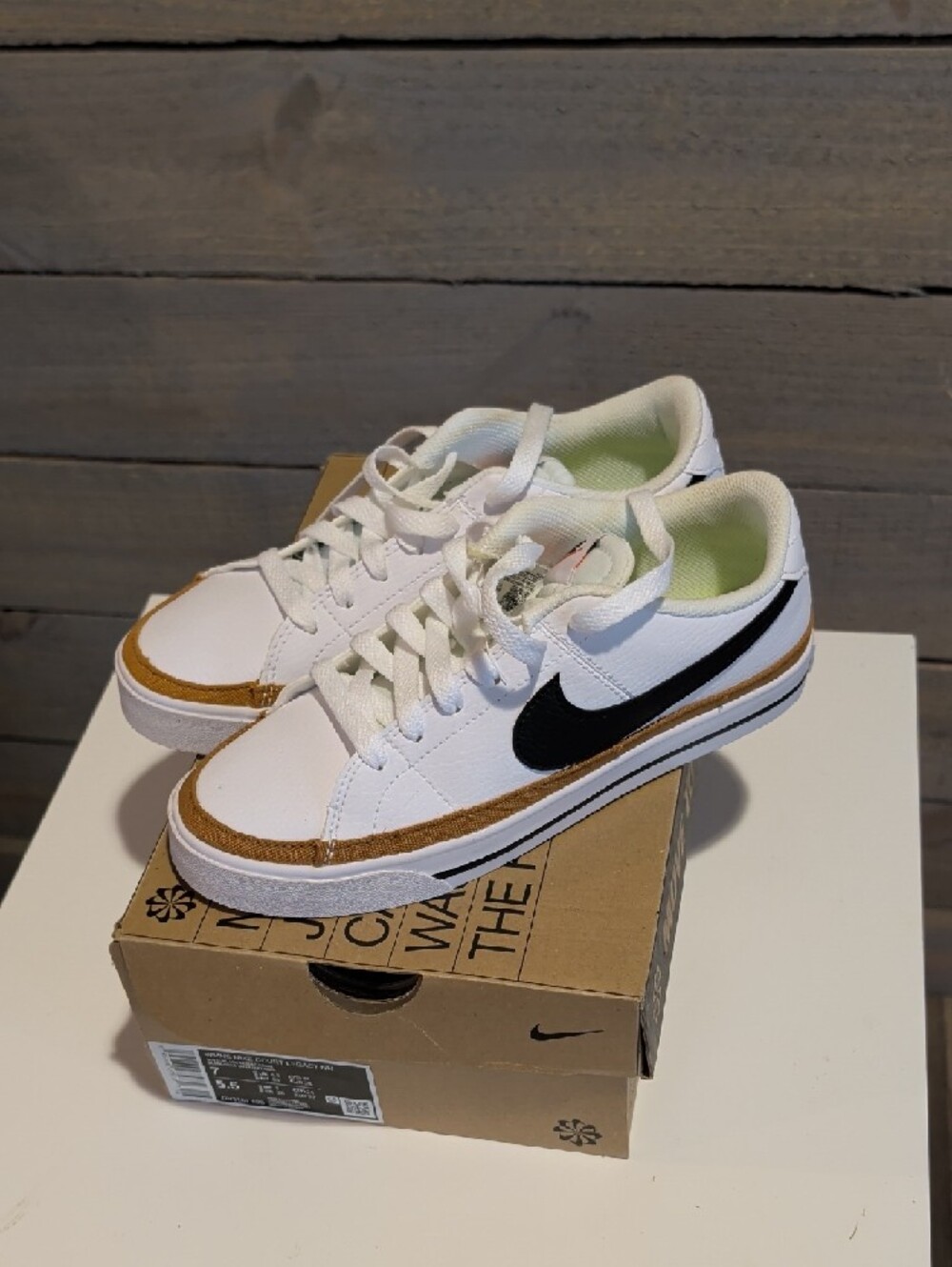 Nike White Sneakers with Black Swoosh and Brown Accent - Picture 4 of 4